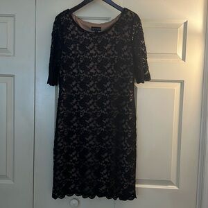 Connected black lace cocktail dress